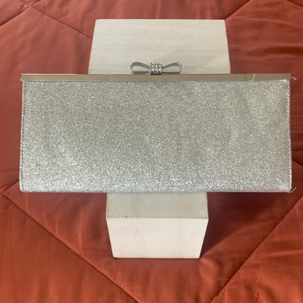 Sparkling Silver Clutch with Bow Detail